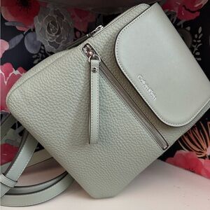 Calvin Klein new without tags backpack in a light teal/mint green color